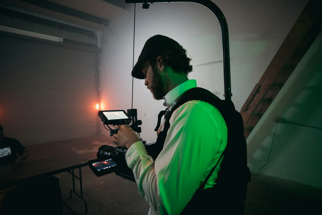 Technician managing a remote live streaming production workflow